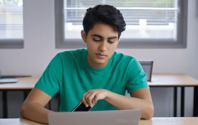 연지동 linux재설치 포맷  초기화 - A young adult, looking frustrated and stressed, sits in front of a laptop that displays a frozen scr...