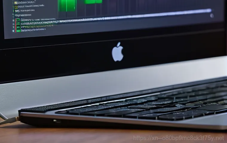 막계동 해킨토시 재설치 포맷  초기화 - A clean and minimalist workspace featuring a modern computer setup. On the main monitor, an interfac...