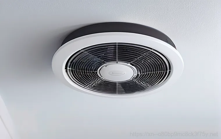 비산동 팬돌다 멈춤 - A close-up shot of an adult man's hands, wearing practical work gloves, carefully examining the inte...