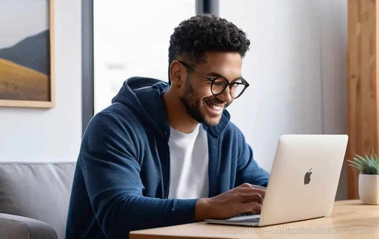 번동 macosX재설치 포맷  초기화 - A close-up shot of a pair of hands, belonging to a person in their late 20s, carefully pressing the ...