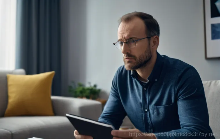 광명동 bootdevice - A young adult, male or female, in their late 20s, sits at a modern desk in a home office setting. Th... 광명동 bootdevice - A young adult, male or female, in their late 20s, sits at a modern desk in a home office setting. Th...