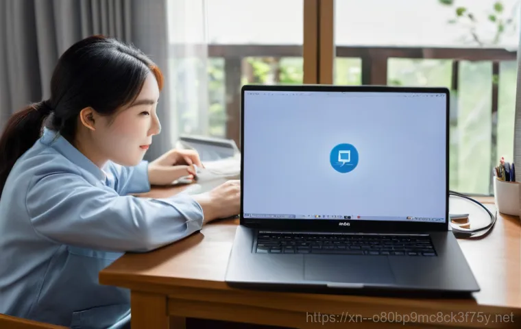 난향동 노트북 laptop 출장방문수리점 - A person in their late 20s or early 30s, dressed in casual yet neat office attire, sitting at a desk...