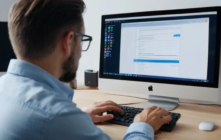 번동 윈도우10 windows10 재설치 포맷 초기화 - A person in their late 20s to early 30s, dressed in comfortable casual wear, sits at a desk, leaning... 번동 윈도우10 windows10 재설치 포맷 초기화 - A person in their late 20s to early 30s, dressed in comfortable casual wear, sits at a desk, leaning...