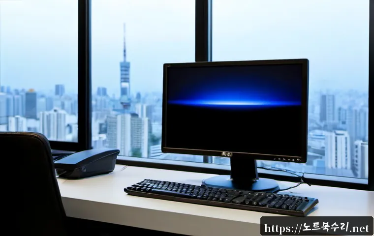 중구 IRQL_NOT_LESS_OR_EQUAL - Photorealistic IT support workstation in Jung-gu, Seoul, a desktop monitor showing a plain cobalt-bl...