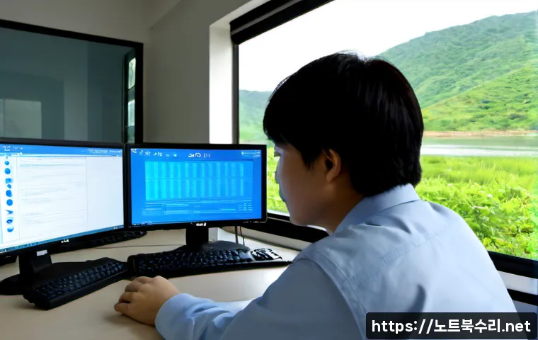 와부읍 STATUS_KERNEL_DEBUG_FAILURE - Photorealistic IT support workstation in Wabu-eup, dual monitors showing a clean abstract blue diagn...