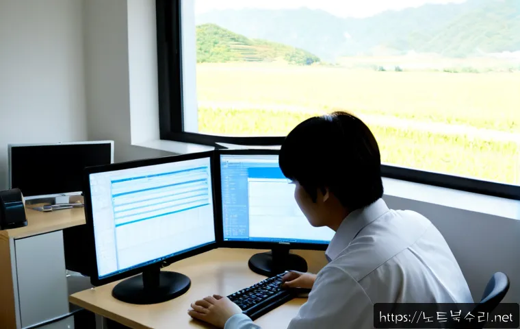 서운면 STATUS_KERNEL_MODULE_CORRUPTION - Photorealistic remote IT support workstation in a quiet rural Korean office, dual monitors showing a...