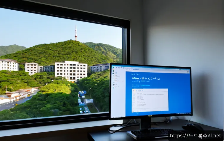 안암동 BOOTMGR is missing - Photorealistic IT support workstation in a compact Anam-dong office, desktop monitor showing a dark ...