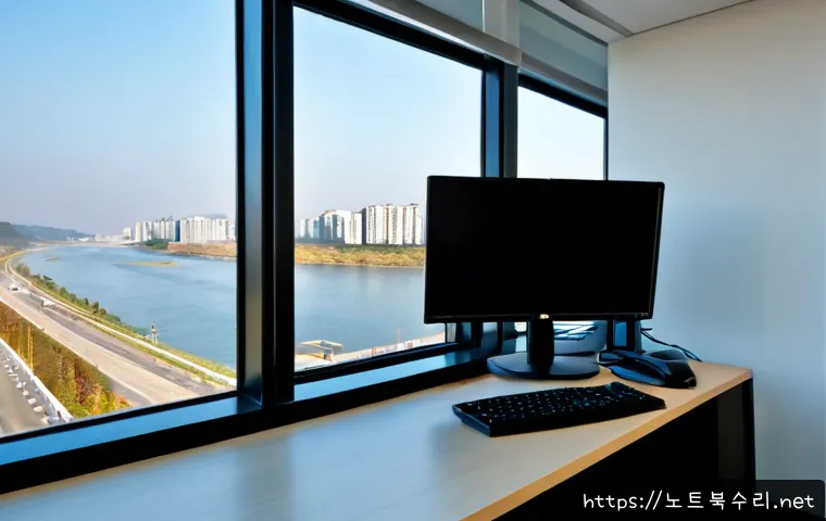 구리시 STATUS_DRIVER_ENTRYPOINT_NOT_FOUND - Photorealistic IT support workstation in a modern Guri apartment office, dual monitors showing a bla...