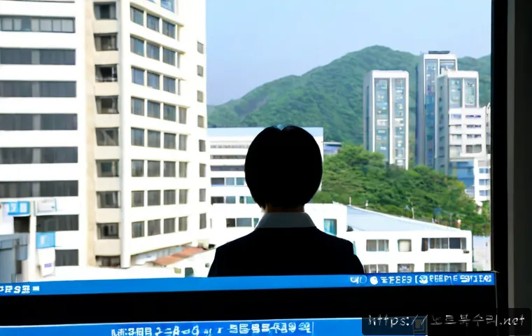 여수동 DPC_WATCHDOG_VIOLATION - Photorealistic IT support workstation in Yeosu-dong, a desktop monitor showing a blank blue system c...