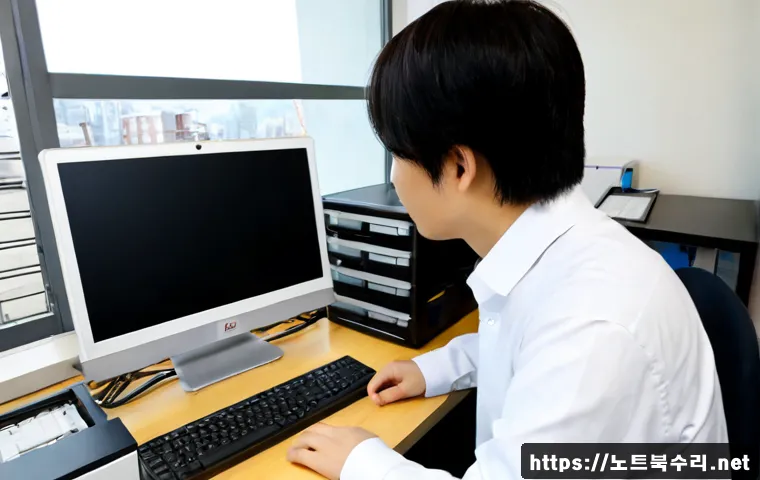 율목동 STATUS_NO_MEMORY - Photorealistic IT support workstation in a compact Yulmok-dong office, exhausted technician studying...